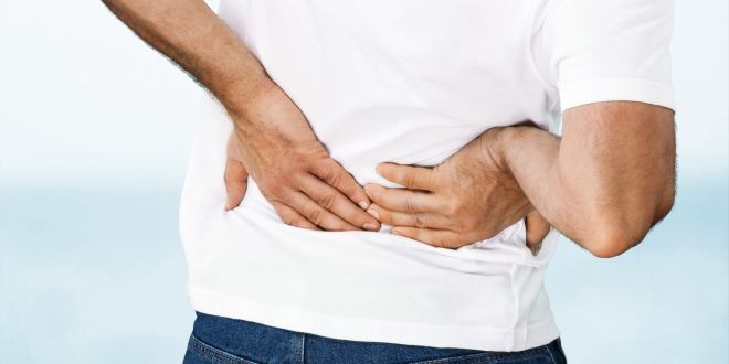 Rückenschmerzen können ein Symptom von Darmkrebs sein